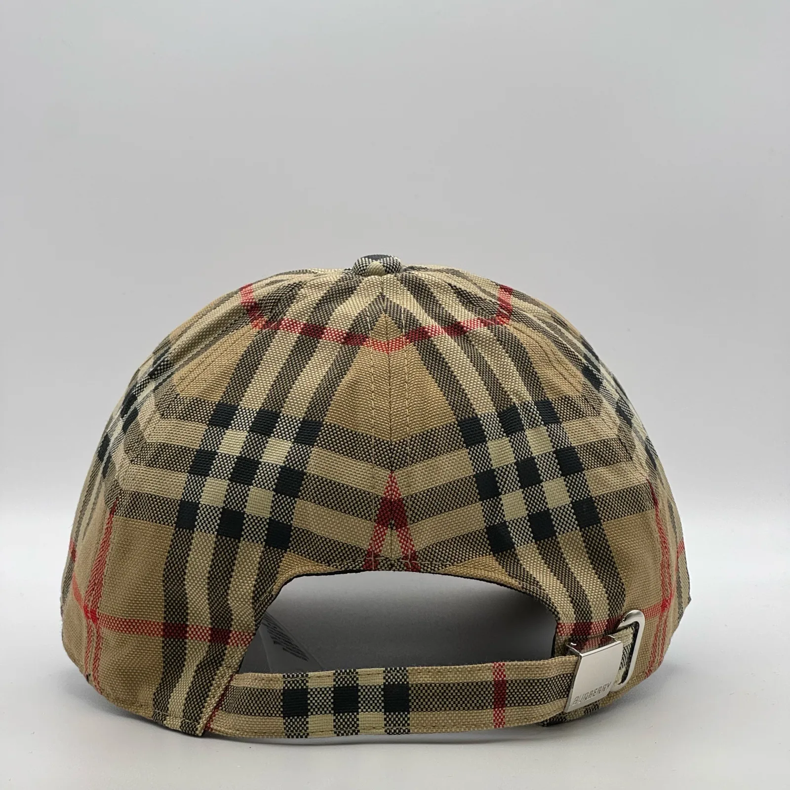 Archive beige vintage check Burberry cap, back view showing the metal buckle strap.