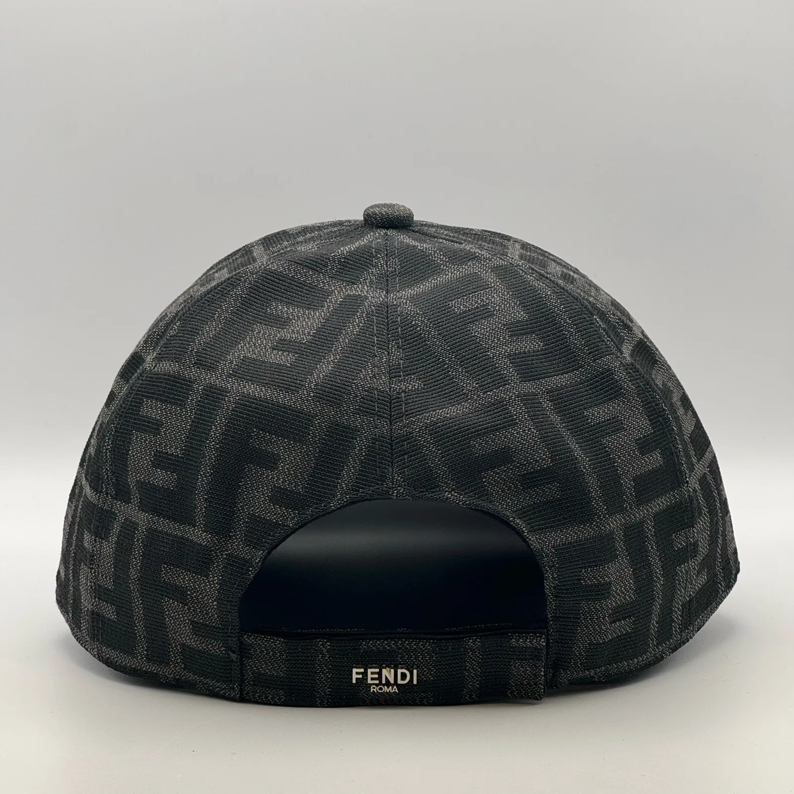 Black-on-black Fendi FF cap, back view showing the Fendi Roma tab.