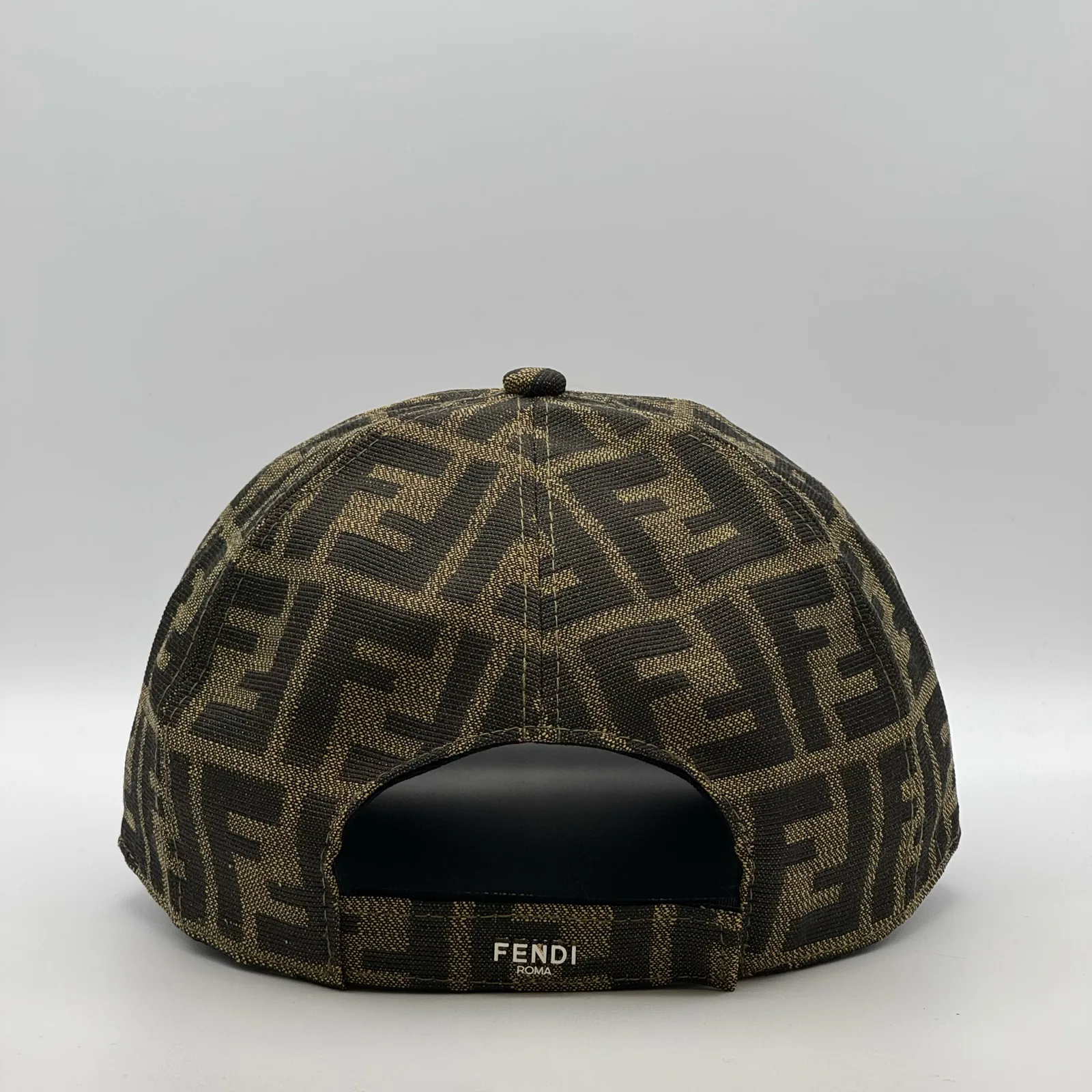 Brown Fendi FF cap, back view showing the Fendi Roma tab on the strap.