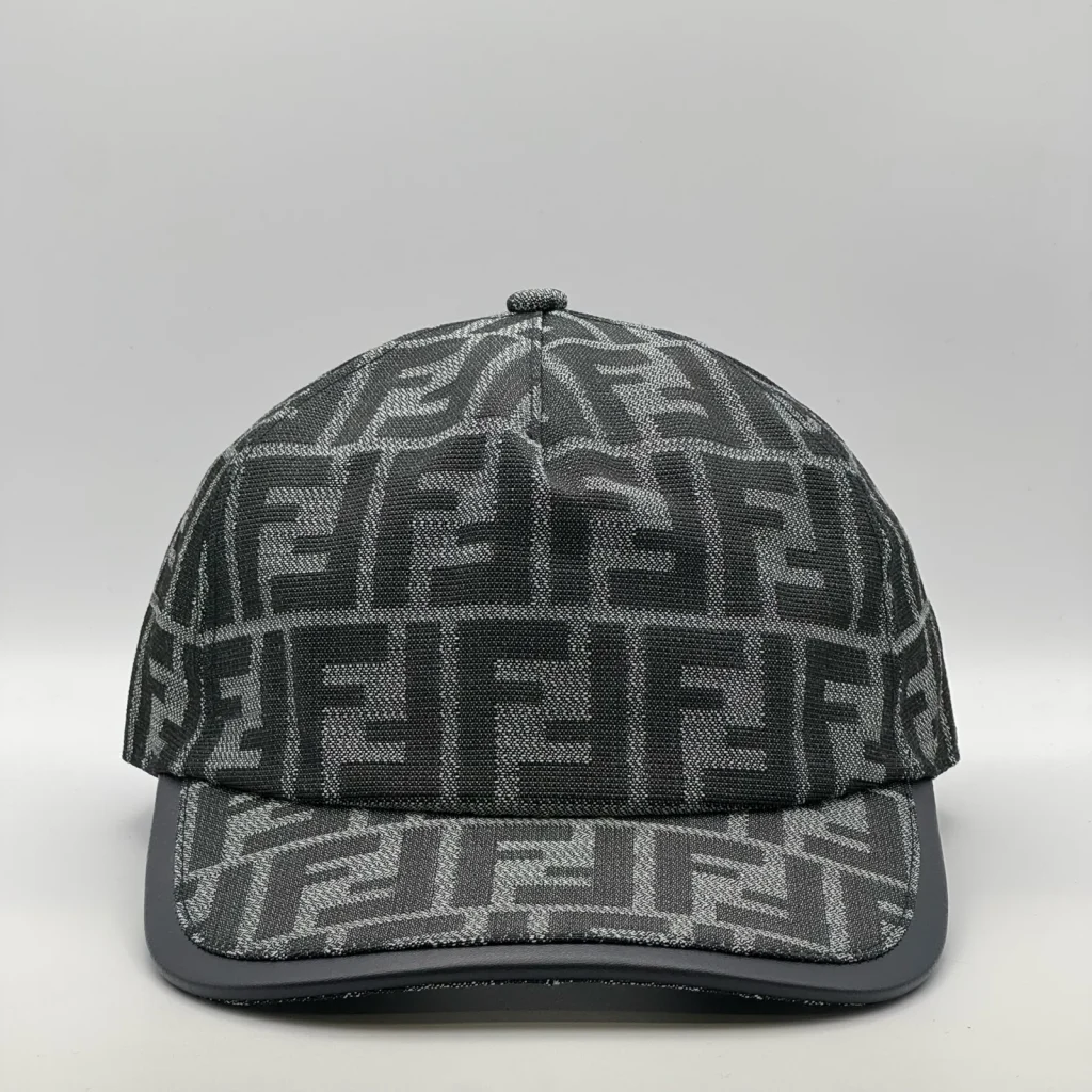 Charcoal grey Fendi FF cap, three-quarter front-left view.