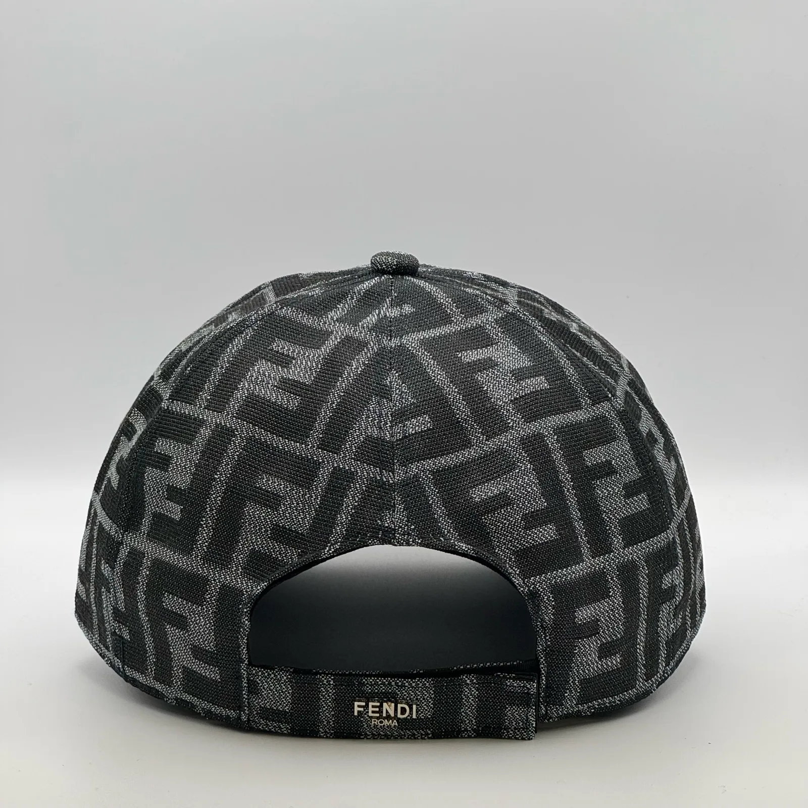 Charcoal grey Fendi FF cap, back view showing the open adjuster.