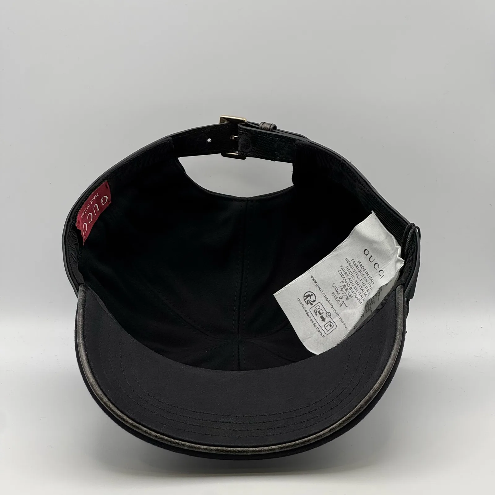 Black GG band cap interior, brand tag and care label
