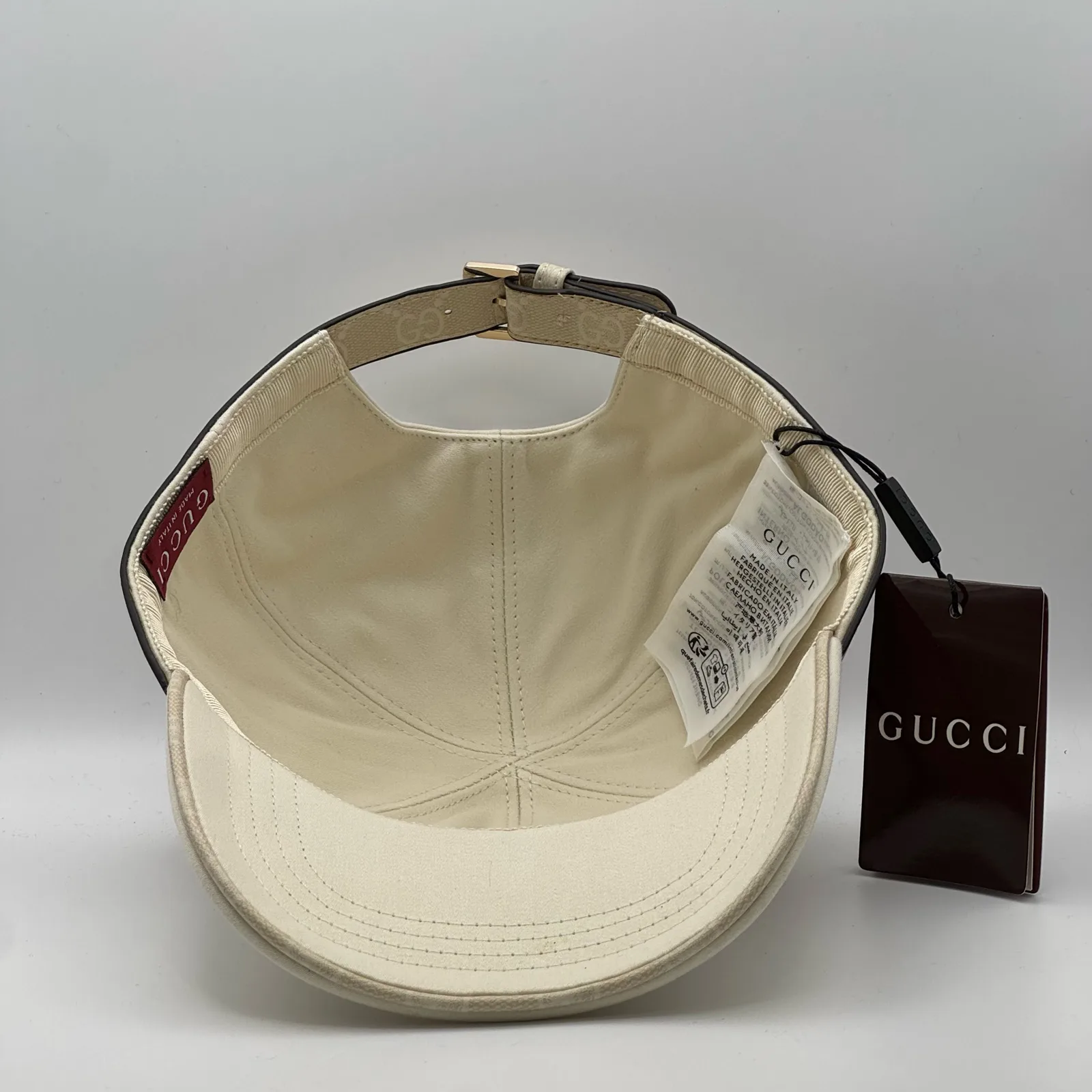 Cream GG band cap interior, brand tag and care label