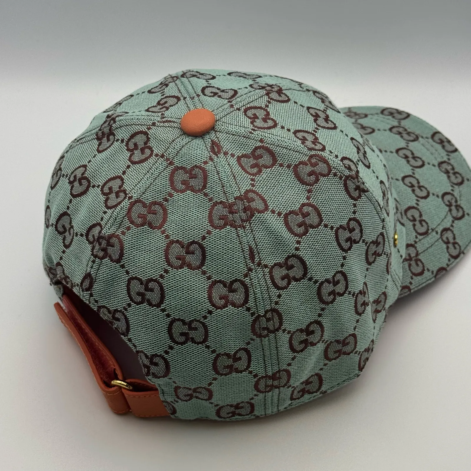 Mint green GG canvas cap, three-quarter back view showing the crown and brim