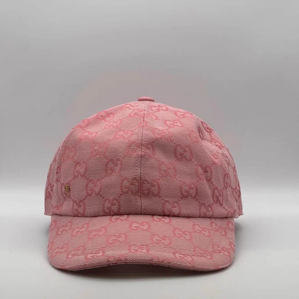 Pink GG canvas cap, front three-quarter view with a subtle tonal jacquard pattern