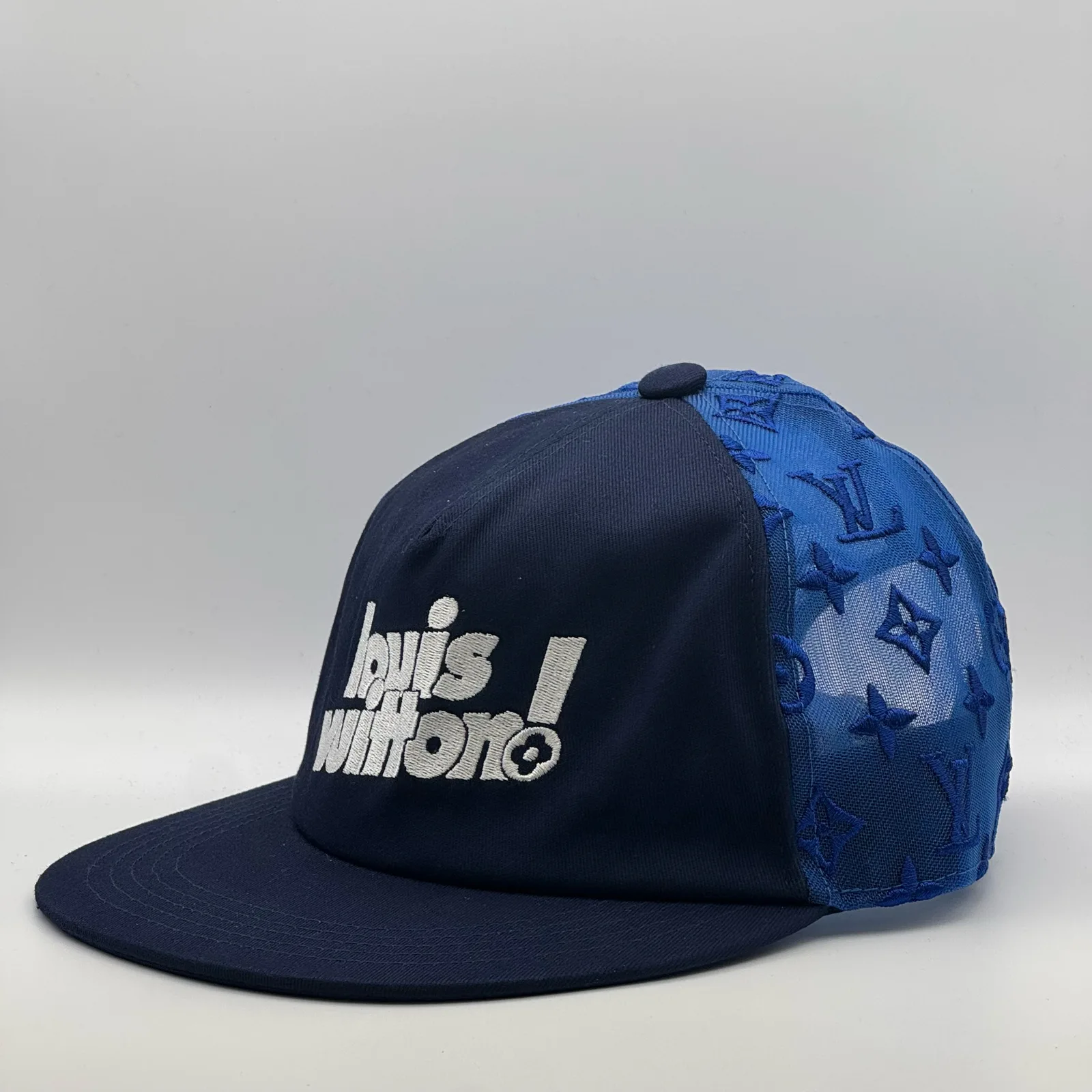 Navy logo mesh cap, opposite side view.